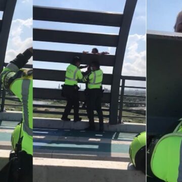 Policías auxilian a mujer con problemas economicos de saltar del puente Pumarejo